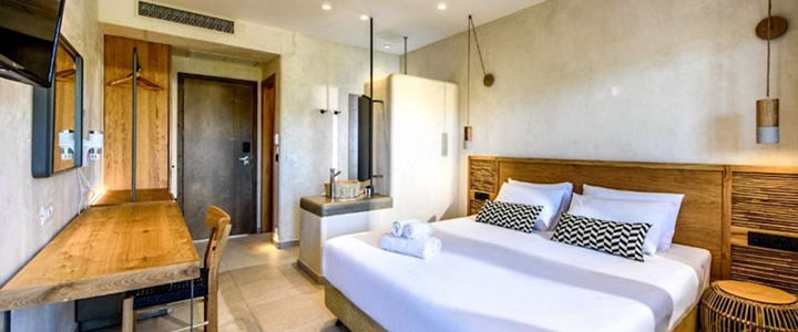 Stella Village 4* - Im typisch kretischen Stil gestaltet, bietet das kinderfreundliche Hotel geräumige und ansprechende Zimmer für einen angenehmen Aufenthalt.