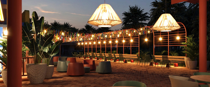 Außenbereich mit vielen Sitzmöglichkeiten am Abend in warmem Licht und erdigen Tönen, einladend zum gemütlichen Verweilen.